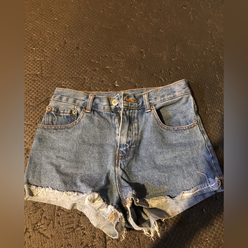 Denim shorts with frayed cuffed hem